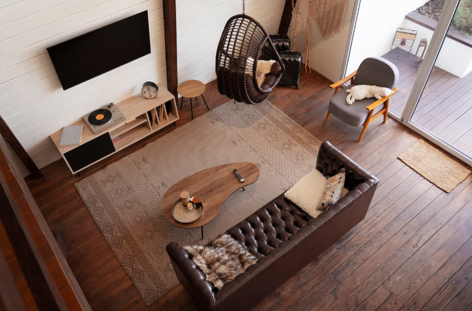 Living room with wide-plank hardwood flooring, a timeless flooring trend that adds warmth and style.